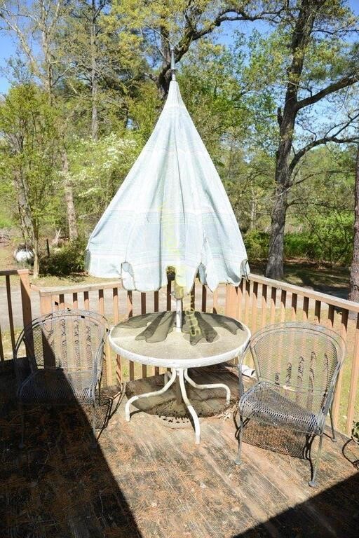 PATIO TABLE W/UMBRELLA AND TWO CHAIRS