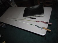 fishing poles,new rugs & briefcase