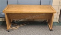 Wooden school table on casters. 27½×60×26.