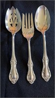 3 Sterling silver serving spoons, by
