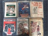 Antique Mickey Mouse and other sheet music