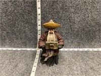 Old Man in Hat with Box Figure