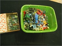 Tub of plastic figures: soldiers,