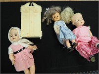 Box with three dolls and a Barbie wardrobe