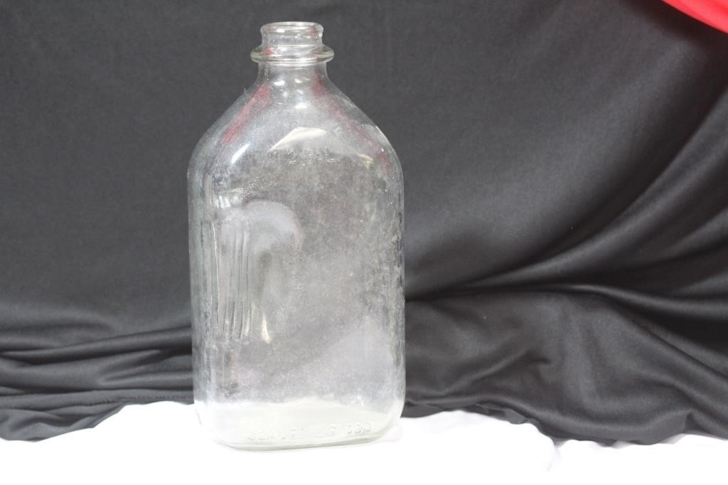 A Vintage Half Gallon Bottle