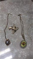 Necklaces  and bird pin