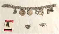 .925 Silver charm bracelet & charms.