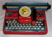 Vintage tin litho toy typewriter.