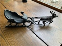 Cast iron sleigh and raindeer