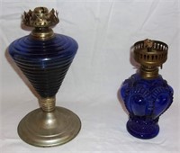 Vintage cobalt blue glass oil lamps.