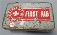 Detroit First Aid metal box with some contents.