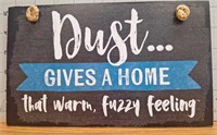 Wooden sign "Dust gives a home that warm fuzzy