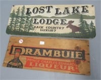 (2) Wood signs, cabin and booze crate end.