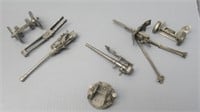 (3) Miniature pewter artillery cannons.