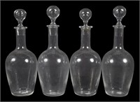 4 BACCARAT DECANTERS AND STOPPERS