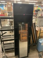Shelving unit with full length mirror.