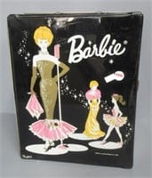 1962 Barbie case with dolls and accessories.
