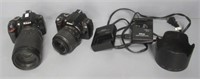 (2) Nikon camera with lenses, battery charger