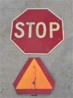 Stop sign and Slow moving vehicle farm sign