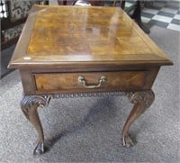 Wood carved end table by Gaska Tape Inc. with