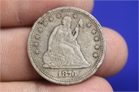 An 1876-S Seated Quarter