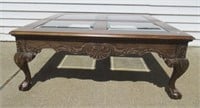 Wood coffee table with glass panes for top, ball
