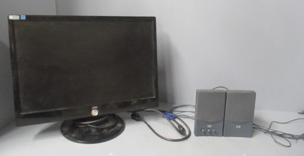 Computer monitor with speakers.