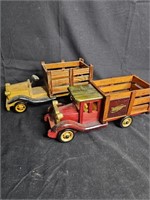 2 wooden stake bed trucks. 1 is Heritage Mint &