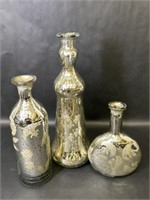 Three Shiny, Reflective Vases