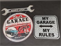 Two Metal Garage Repair Signs