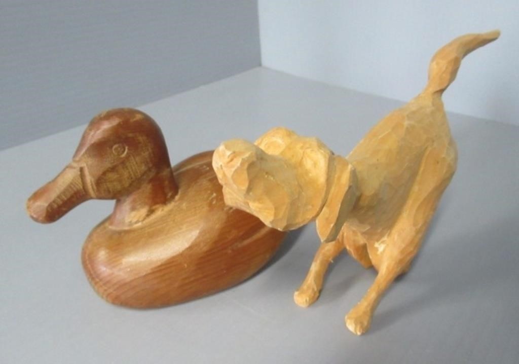 Hand carved wood duck and dog signed figures.