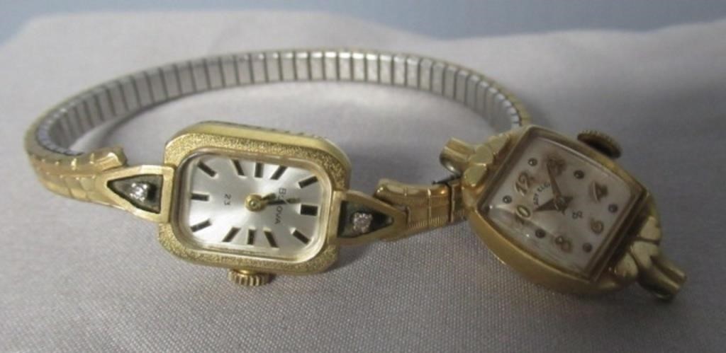 Vintage wrist watches, one with band. Bulova