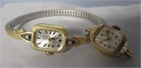 Vintage wrist watches, one with band. Bulova