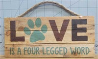 Wooden sign "Love is a four legged word"