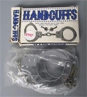Handcuffs with keys.