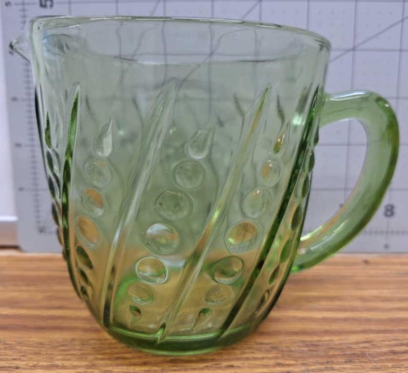 Green glass pitcher