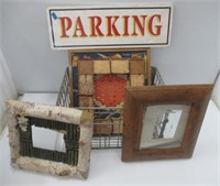 Vintage Lawason milk crate with picture frames.