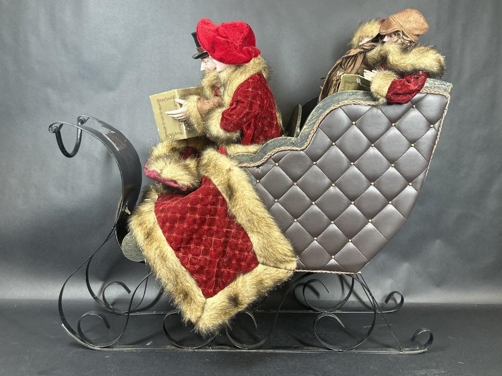 Lux sleigh with four carolers holiday decor