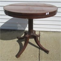 Round top table with glass top, 28"H x 28"W.