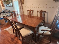 Dinning table  65"L 44"w - has 2 12" leaves, 6