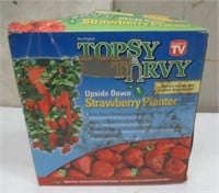 Topsy Turvy upside-down strawberry planter.