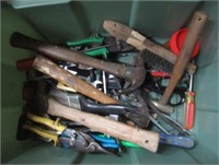 Hand tools including hatchet, hammers, snips,