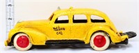 Yellow cast iron taxi
