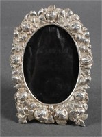 ANTIQUE STERLING REPOUSSE PICTURE FRAME