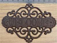 Cast iron welcome sign