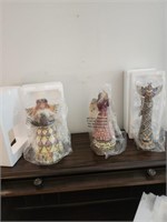 Collection of Jim Shore angels with boxes