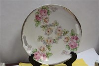 An Antique Rose Plate