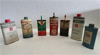 Vintage oil cans and powder cans