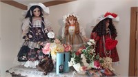 Dolls, candles & rest of top of armoire
