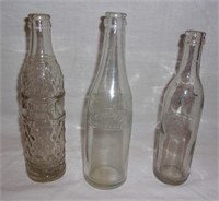 Vintage Pepsi pop bottles.